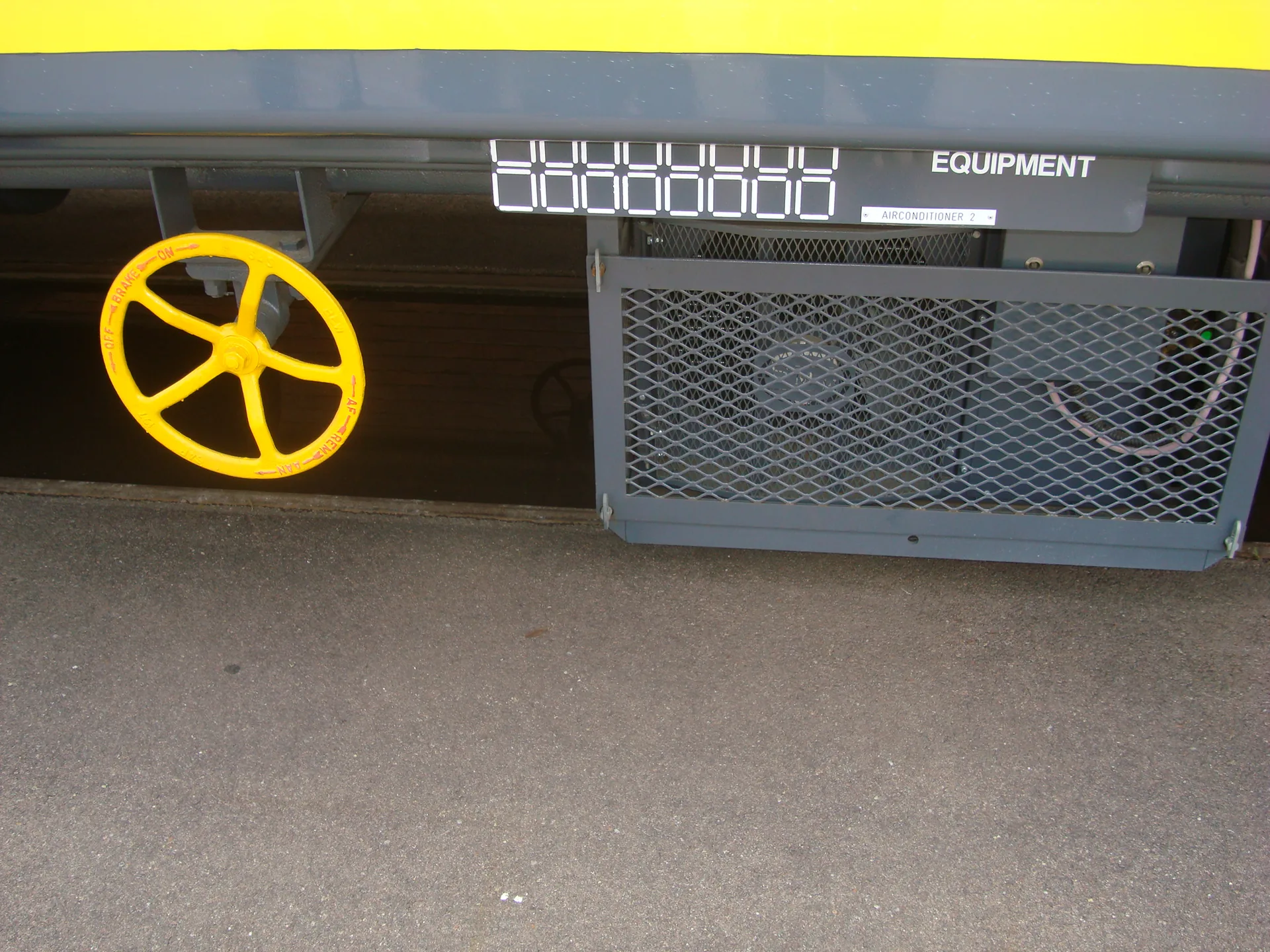 CFB Angola coach equipment bay — brake wheel and air conditioning installation