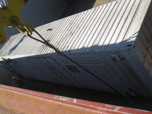 CFB Angola generator wagon being lowered into ship hold at Durban port