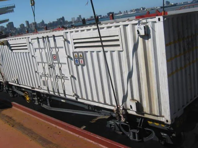 CFB Angola generator wagon on vessel deck — Durban skyline in background