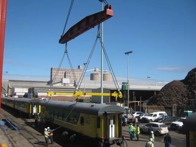 CFB Angola passenger coach rigged with lifting beam for crane loading