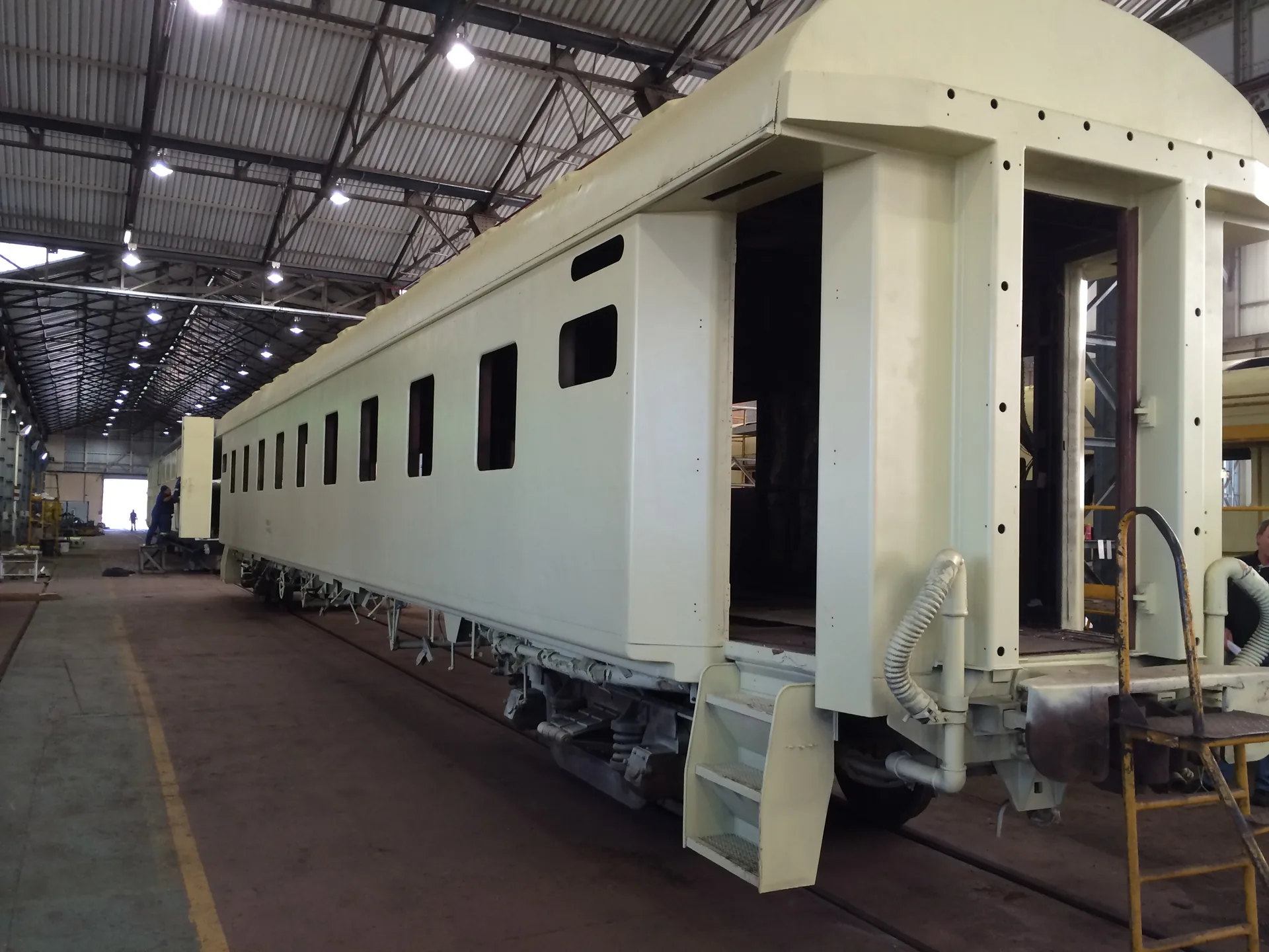 CFB Angola passenger coach full side view with primer coat applied