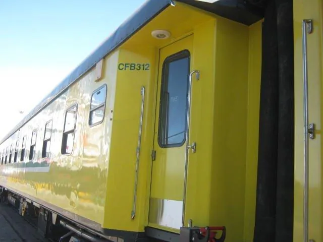 CFB312 refurbished passenger coach port side — ready for shipping to Angola