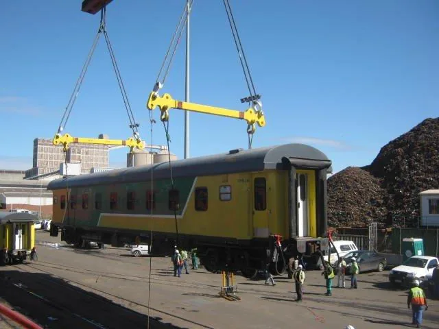 Coach rigged crane lift